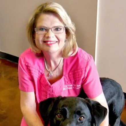 Portrait of Dr. Vickie Lawrence with dog 